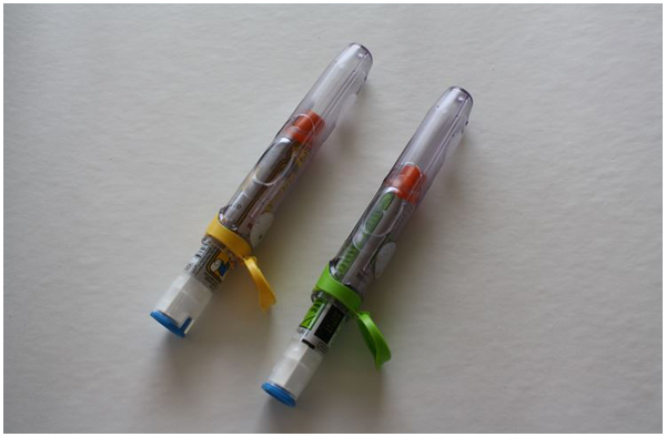 EpiPens halfway out of carrying case